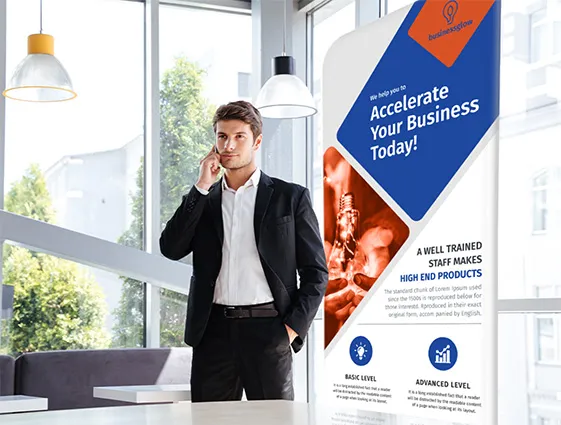 Textile advertising stand with printed graphic in a modern office next to a standing man