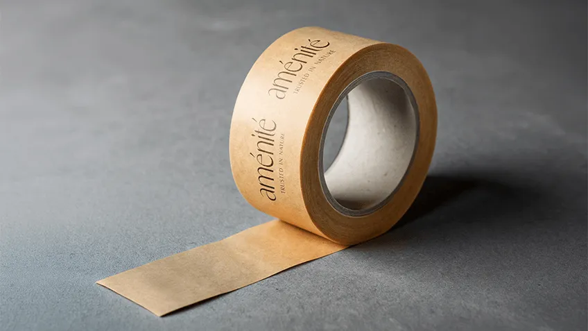 Roll of printed Kraft paper tape on a dark background