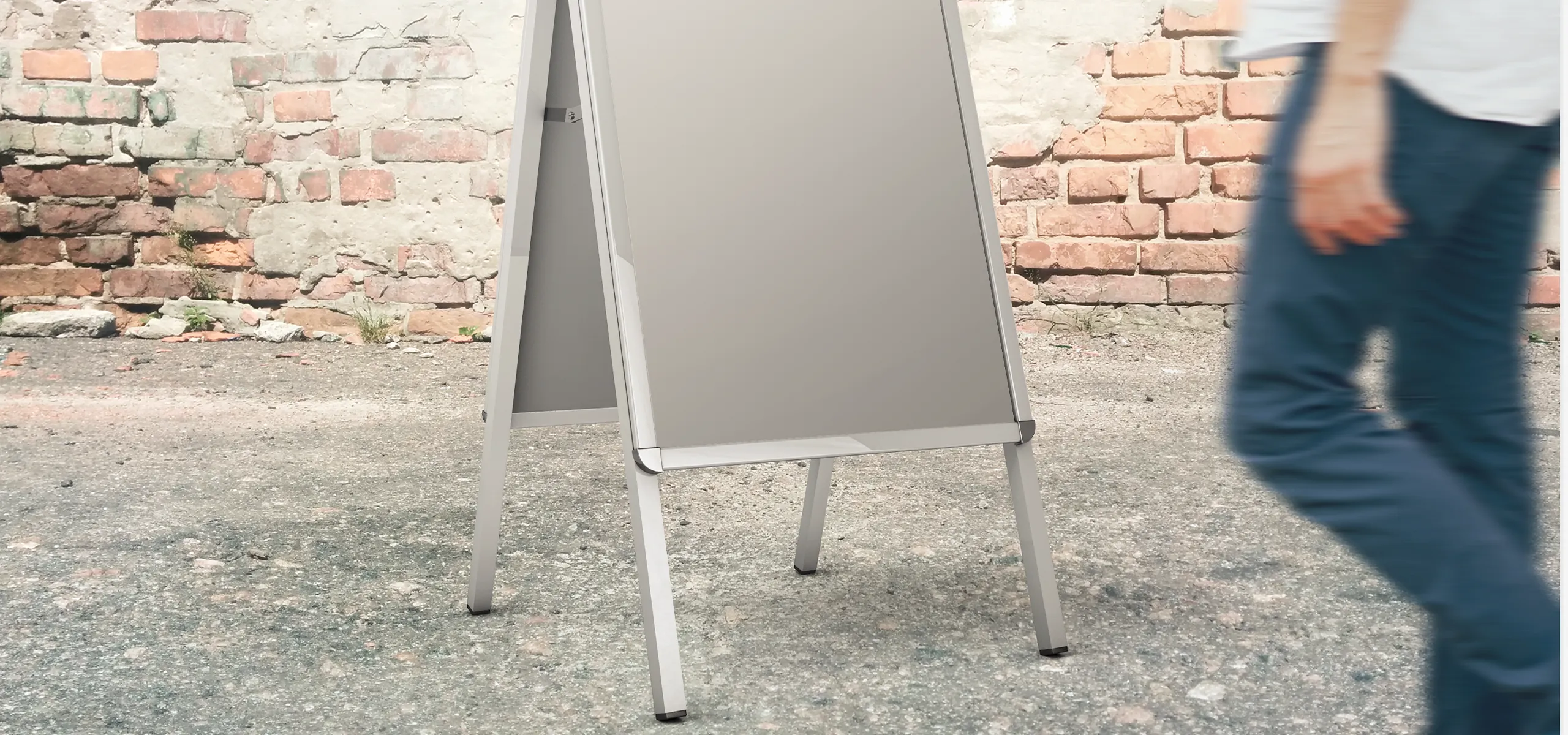 A-board advertising stand placed outdoors in front of a building