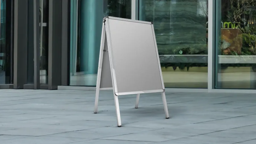 Aluminium A-board advertising stand placed indoors