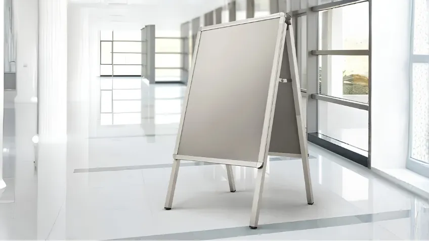 A-board advertising stand placed outdoors in front of a building