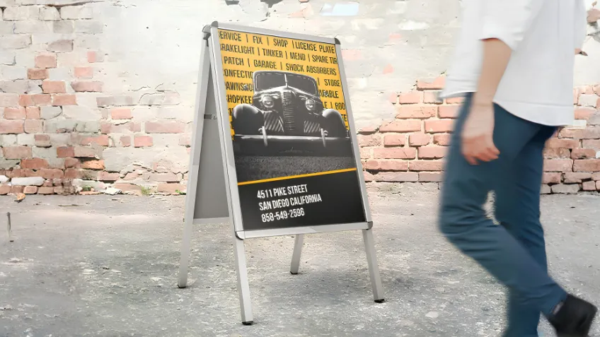 Aluminium advertising A-board with a poster placed outdoors