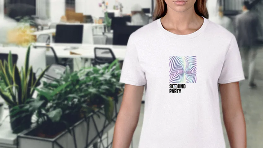 White women's Classic T-shirt with front print shown in an office