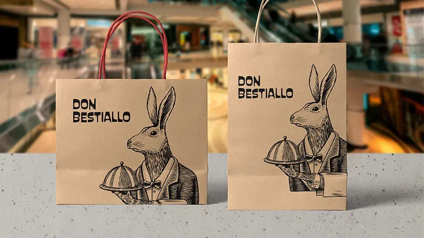 Two kraft paper bags with personalised print in a shopping centre