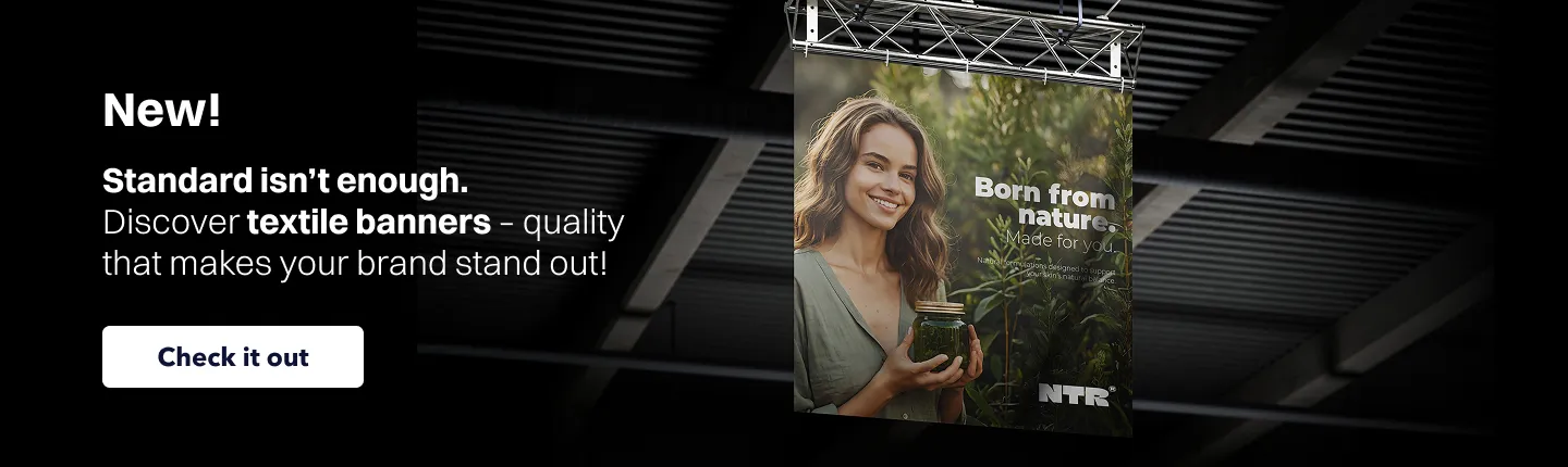 Website banner promoting textile banners with the text “New! Discover textile banners – quality that makes your brand stand out”