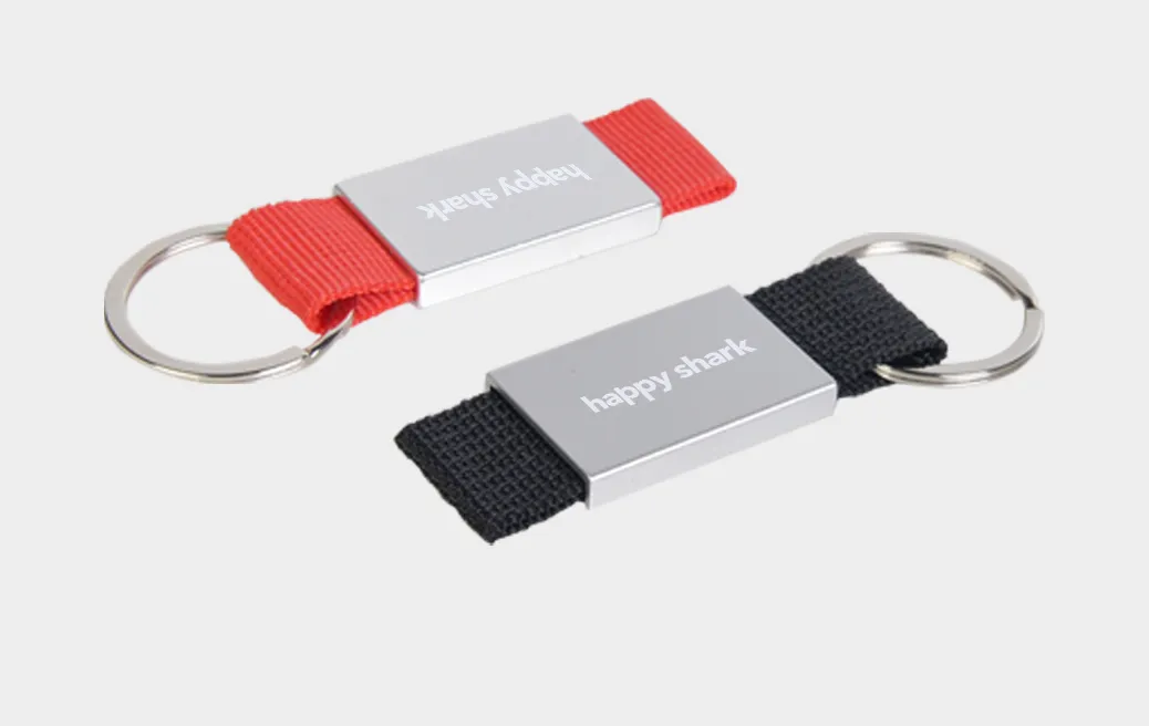 Key rings with coloured ribbon and plate