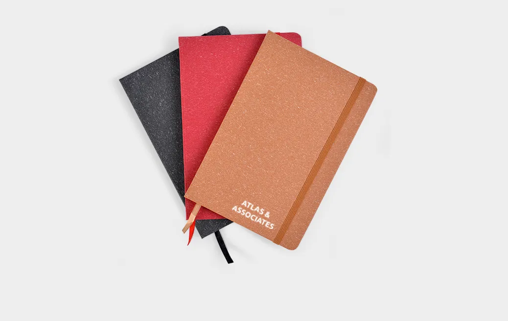 A5 notebook in paperback, hard cover with elastic band