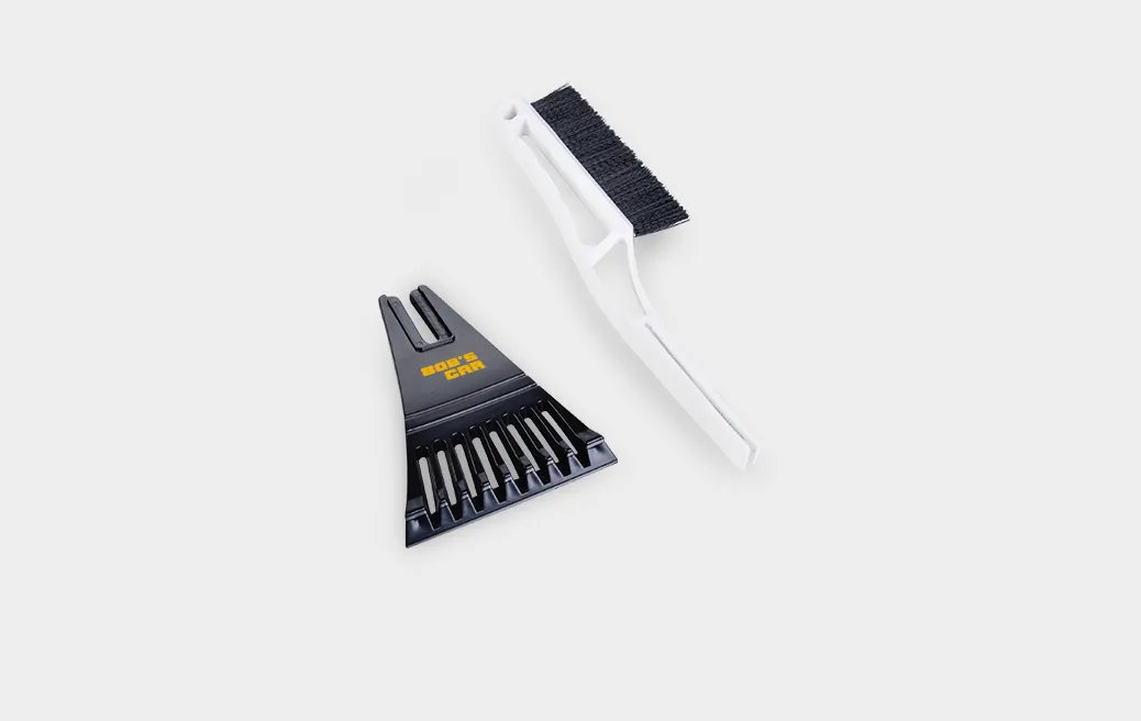 Scraper with broom